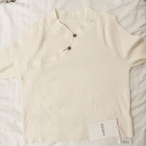 Eggka cream asymmetrical button ribbed knit top